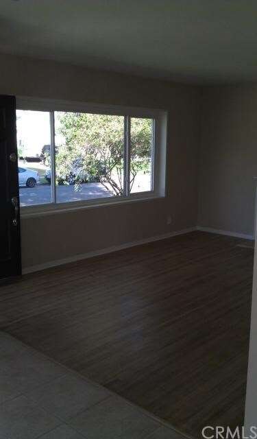 Large Livingroom Window Gives An Open Feeling To T