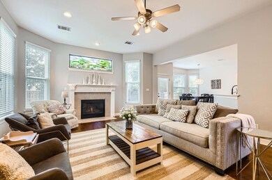 Living room featuring light wood-style flooring, 