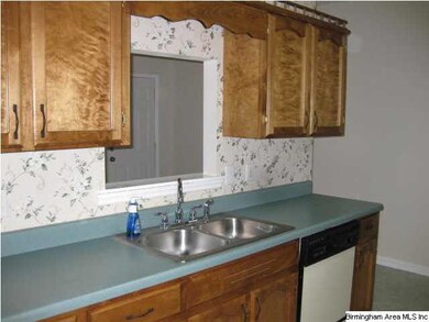 Another view of the kitchen with new faucet and ca