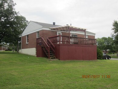 Back of house showing covered Deck