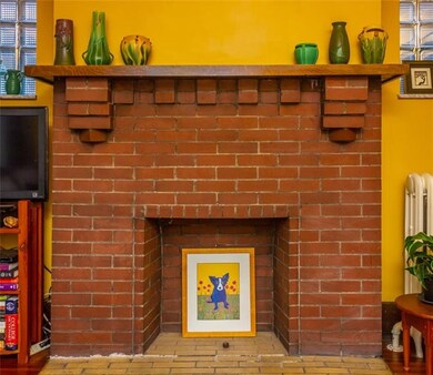 The decorative fireplace adds a nice touch to the 