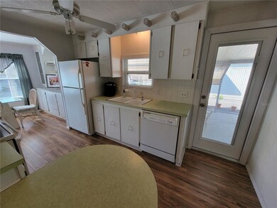 access to carport and entryway to kitchen