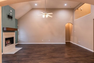 Huge two-story living room with gas/wood burning f