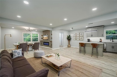 Virtually Staged Open Concept Living Room Dining Room and Kitchen