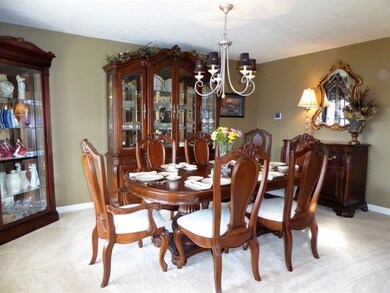 16x12' Dining Room with newer neutral carpeting (D