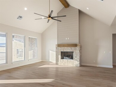 Unfurnished living room featuring light wood-type 