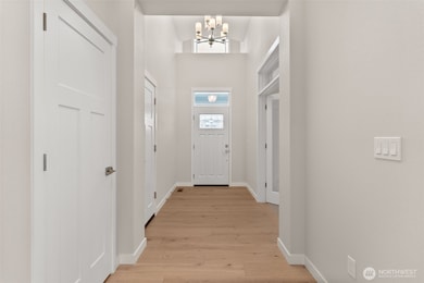 Entry hallway looking back to front door.