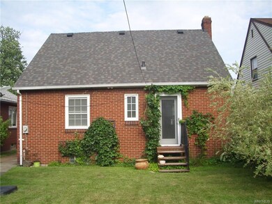 Exterior Back All Brick Cape Cod