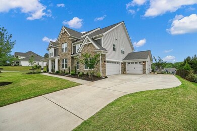 Ample parking with 3 car side entry garage
