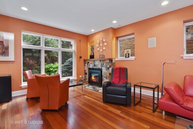 Living Room sitting area by gas fireplace with cus