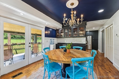The dining area has a built-in hutch/bar—perfect f