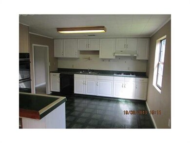 Photo. Kitchen from dining