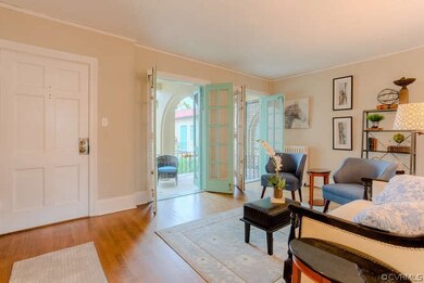 Living room opens to balcony.