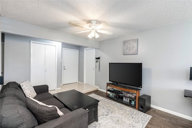 Living room featuring hardwood / wood-style floori