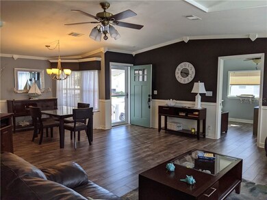 Entrance leads to dining and living rooms