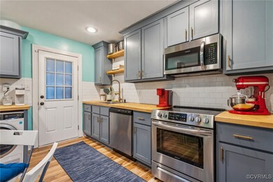 Kitchen featuring sink, light hardwood / wood-styl