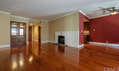 This home features hardwood floors in the living s