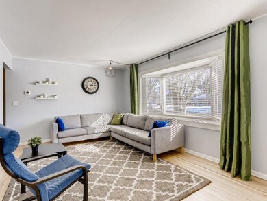 Tons of light flows into Living Room from Front Ba