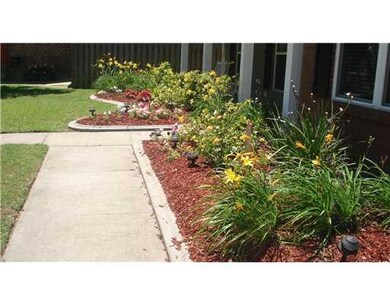 Garden. LANDSCAPED FRONT GARDENS HAVE BLOOMING FLO