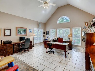 Enclosed Sun room with lots of windows for year ro
