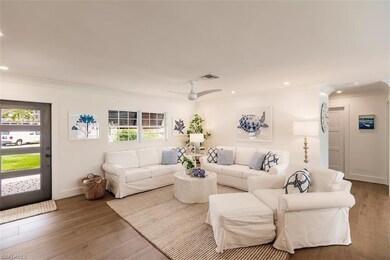 Living room with a wealth of natural light, ceilin