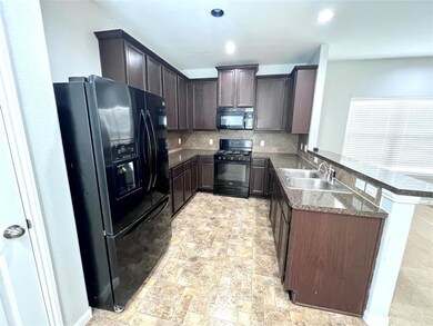 9346 Valley Tree Ln, Houston, TX 77089 - photo 2