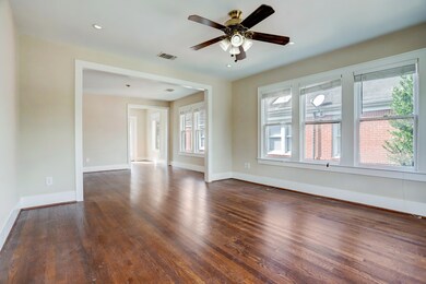 View of living room, flowing into the dinning and