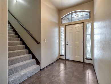 Tiled entrance foyer with a wealth of natural ligh