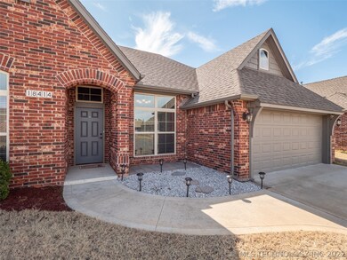 Lovely landscaping and sidewalk will give a warm w