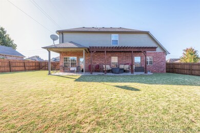 Tons of room to run in this large backyard, covere