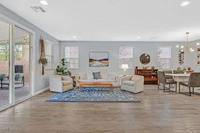 Living area featuring wood finished floors, recess