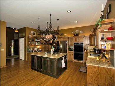Huge kitchen with granite countertops and center i