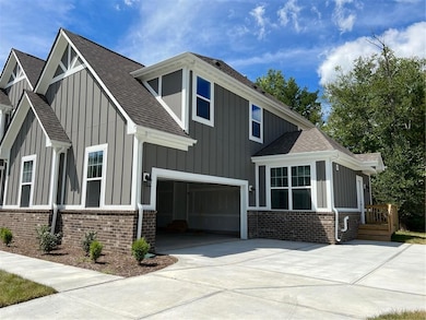 Side with 3 car garage