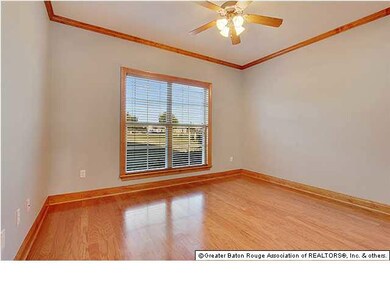 Third bedroom with wood floors