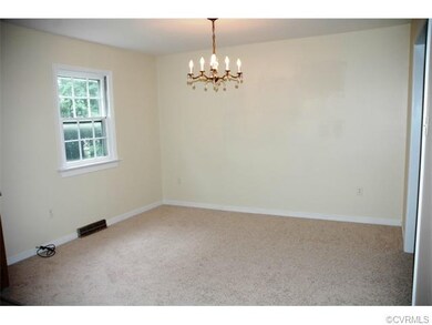 Dining Room with new carpet & padding. Chandelier.