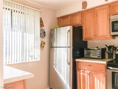 Nice windowed kitchen with updated cabinets and ex