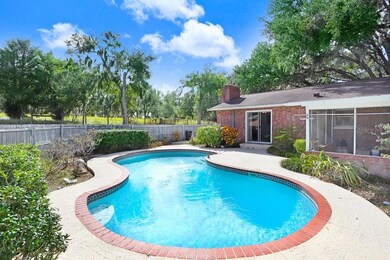 Pool with screened patio