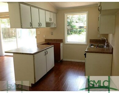 Kitchen. Kitchen has faux granite counter tops wit