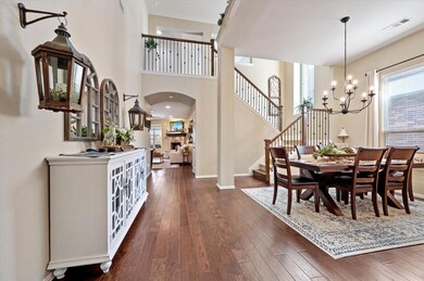 Dining space featuring dark wood-type flooring, a 