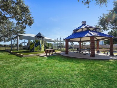 Home is located next to beautiful neighborhood playground.