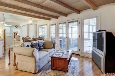 Living room with wood beam ceilings
