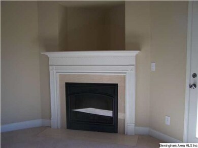 Electric fireplace with granite surround. Just fli