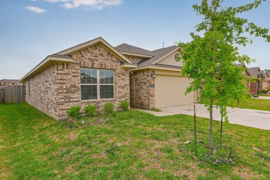 Home has brick on 3 sides.