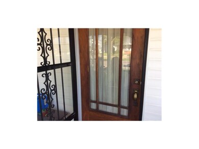 Original wood and glass front door.