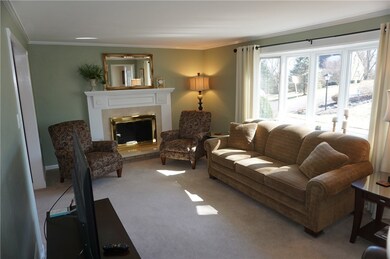 Large Living Room featuring a gas log fireplace &