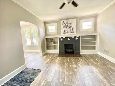 LIVING ROOM WITH ELECTRIC FIREPLACE