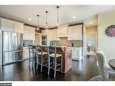 Dramatic hand-sculpted hardwood floors throughout 