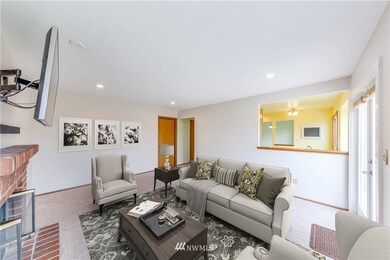 This view shows off how it opens to the kitchen area so the chef of the household won't miss any moments while cooking!