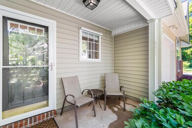 View of patio featuring a garage
