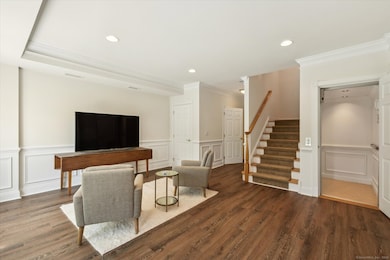 Main entry with multiple uses. Stairs or the elevator lead to the main level.
